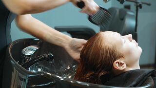 Hair Washing and Scalp Massage by Olga Lady Barber